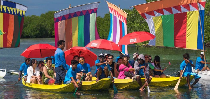 DOT accredited tour guide with group in Zamboanga