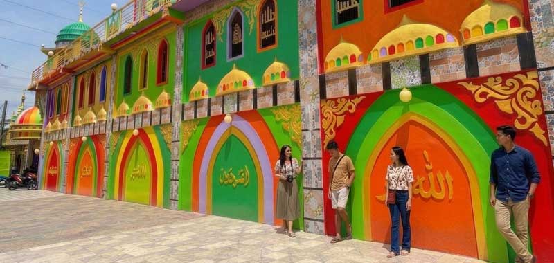 Rainbow Mosque (Masjid Al-Islamia) with golden domes and colorful minarets, Zamboanga City