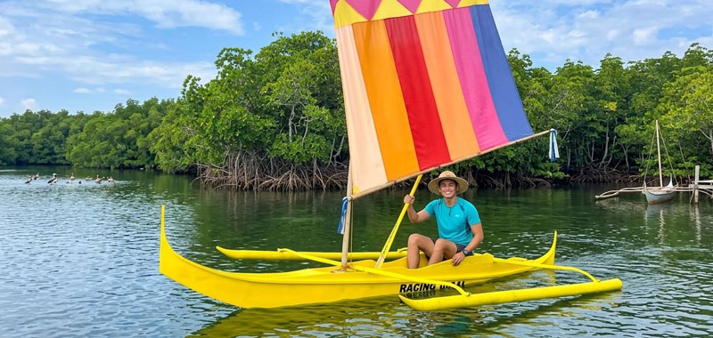 Traditional vinta sailboat ride in Pink Beach Sta. Cruz Island Tour, Zamboanga City