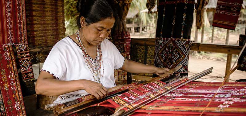 Yakan weaver working a traditional loom at Yakan Village